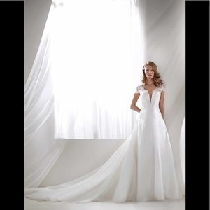 Pronovias Rivera plunging Rivera gown